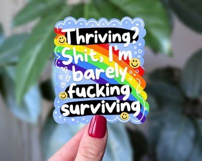 Thriving? I’m Barely Surviving Rainbow Sticker