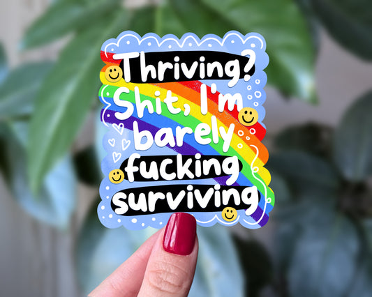 Thriving? I’m Barely Surviving Rainbow Sticker